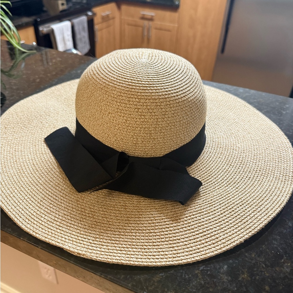 Elegant Tan Sun Hat with Black Ribbon